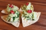 Avocado with tuna fish on tortilla chips