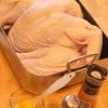 butter, salt and pepper on a turkey