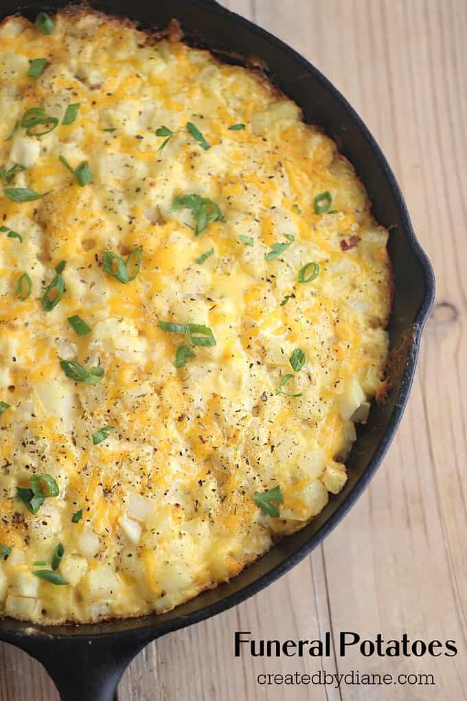 cast iron skillet, baked cheesy saucy potato casserole