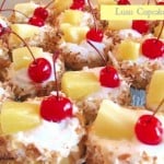 luau pineapple and toasted coconut with pineapple frosting topped with a cherry