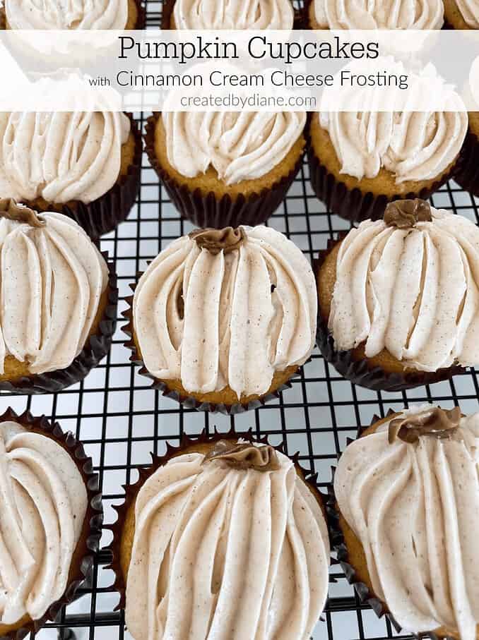 cinnamon cream cheese frosting on pumpkin cupcakes