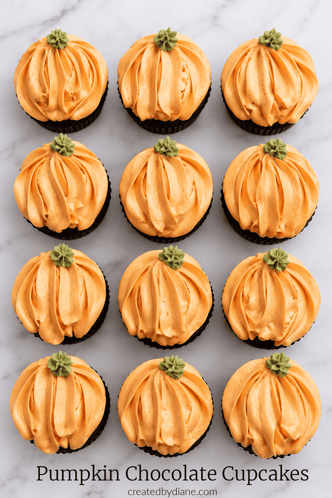 pumpkin chocolate cupcakes with pumpkin cream cheese frosting, a true fall favorite
