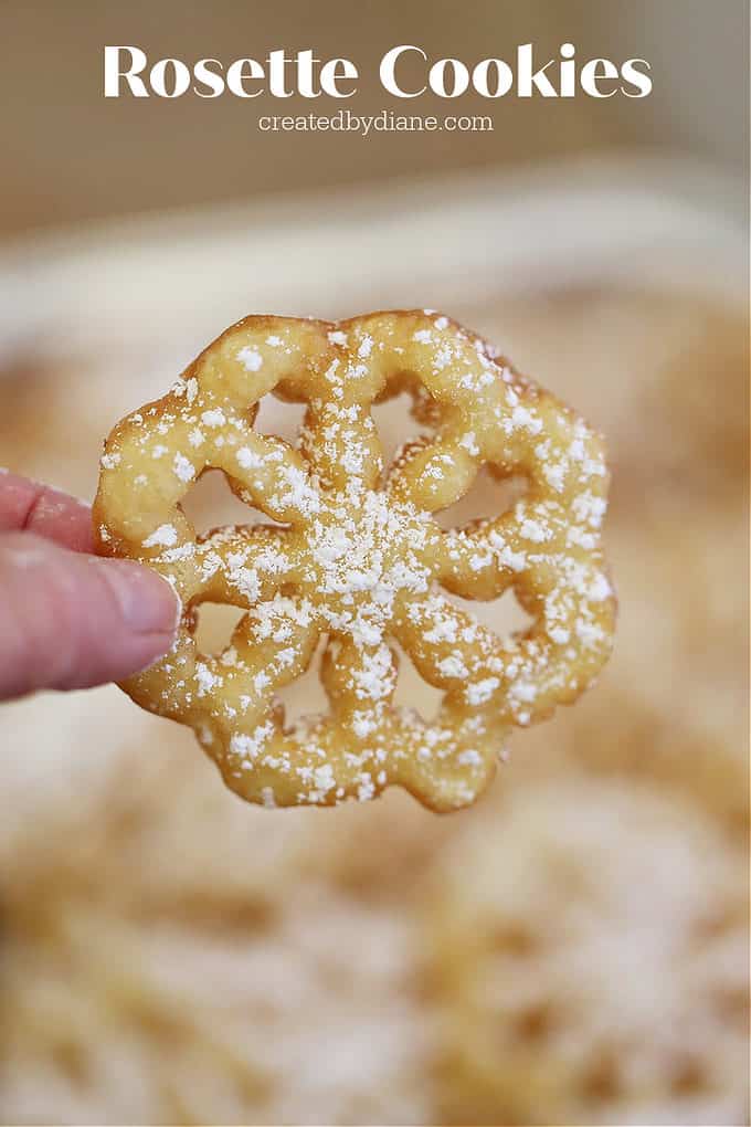 powdered sugar dusted rosette cookie