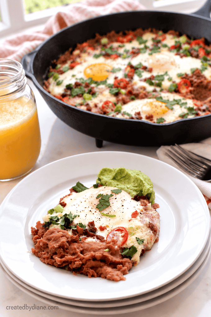 refried beans and eggs in s skillet HURVOS RANCHERSO