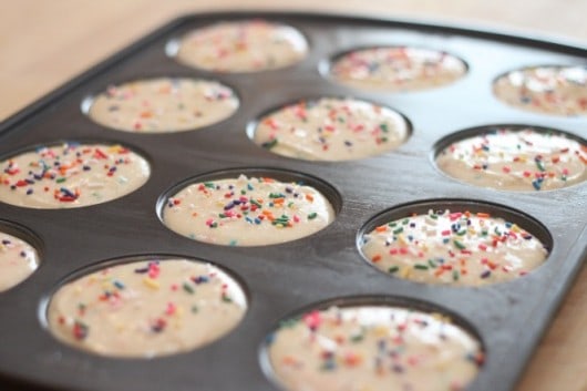 funfetti batter in muffin top pan