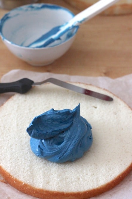 filling cake with blue frosting @createdbydiane