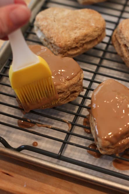 adding glaze icing to scones.jpg