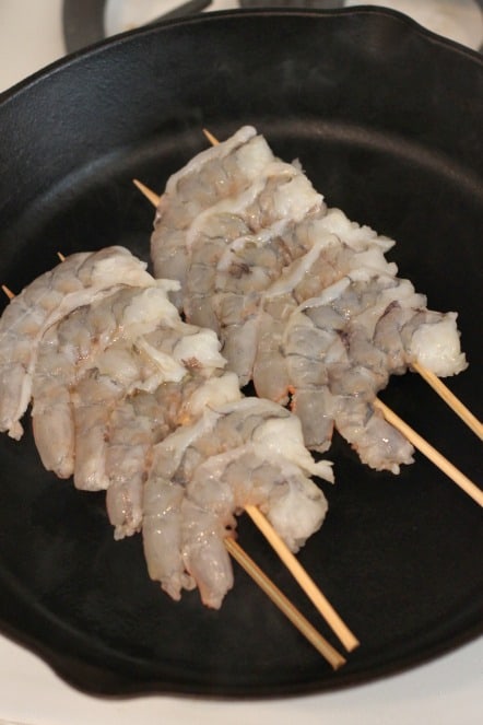 cooking shrimp in a cast iron skillet.jpg