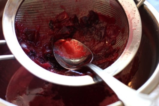 straining cherries for cherry syrup @createdbydiane.jpg