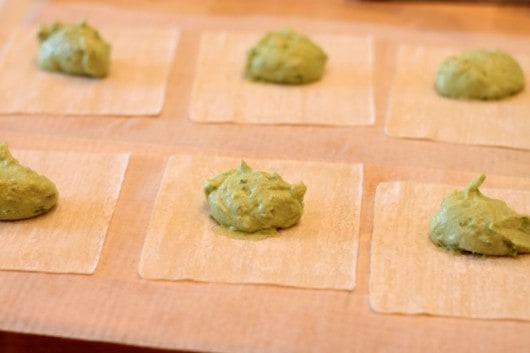 filling wontons for avocado appetizers @createdbydiane