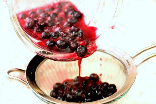 making blueberry curd