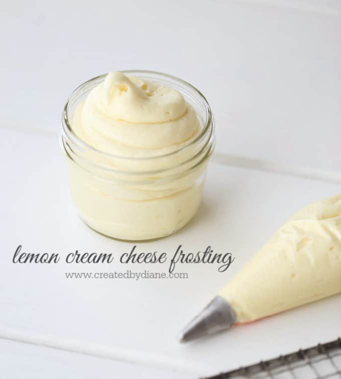 lemon cream cheese frosting in piping bag and in a jar