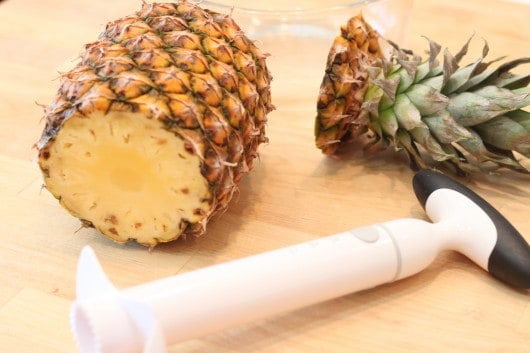 cutting a pineapple