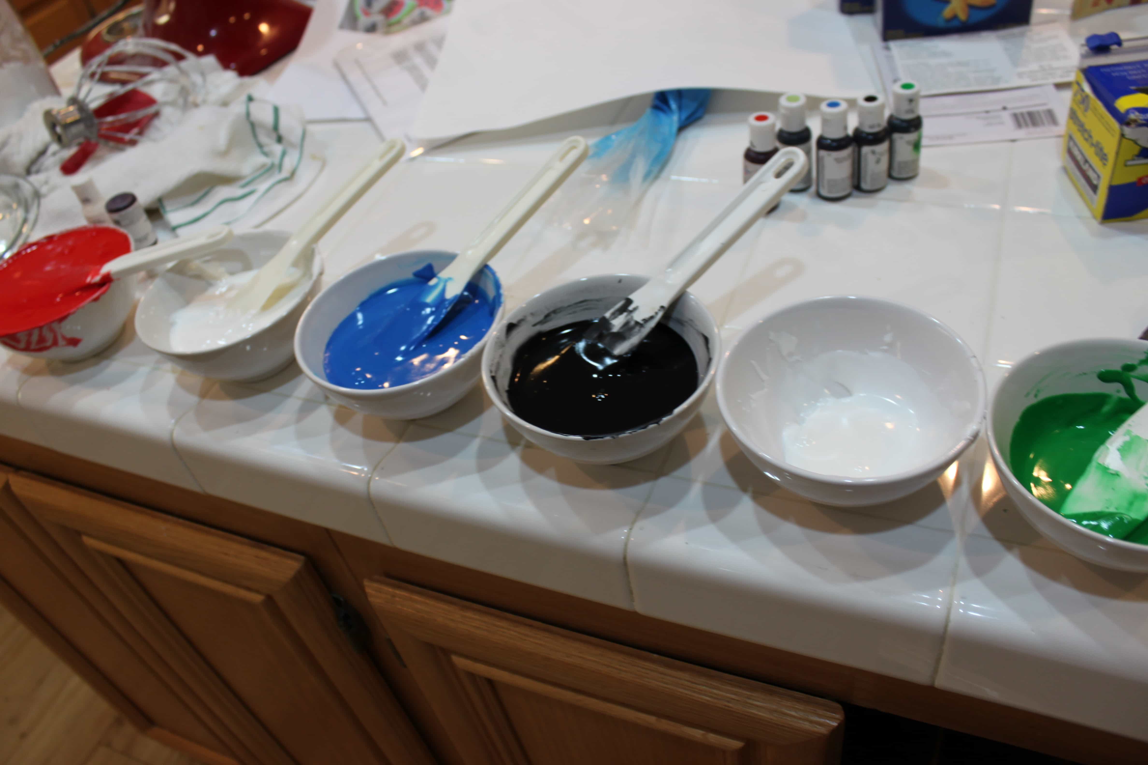 icing, mixing color of icing for decorating cookies with a piping bag @createdbydiane