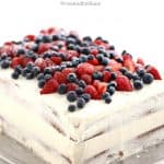 Vanilla Layer Cake topped with berries filled with pastry cream, the EVERY-TIME Cak