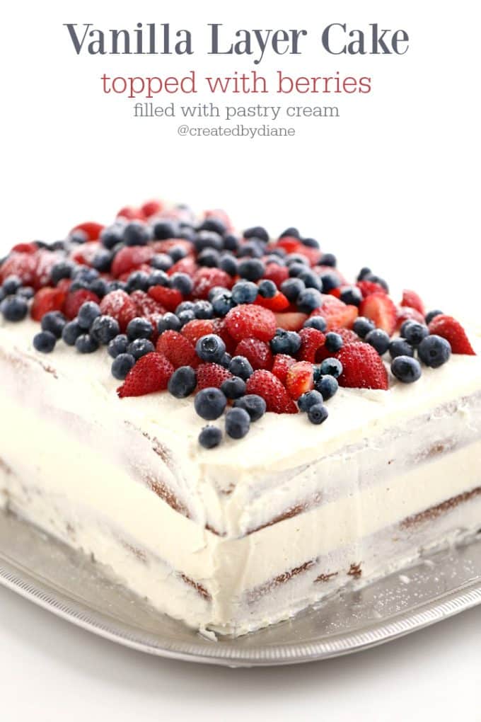 Vanilla Layer Cake topped with berries filled with pastry cream, the EVERY-TIME Cak