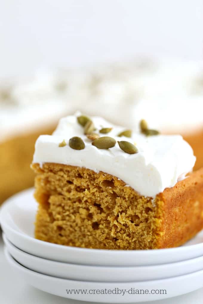 pumpkin cake with whipped cream and pumpkin seeds @createdbydiane