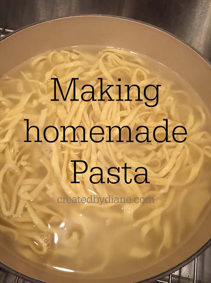 homemade pasta noodles cooking in a pot on the stove