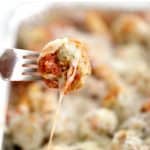 fork with chicken meatball casserole dish for a crowd