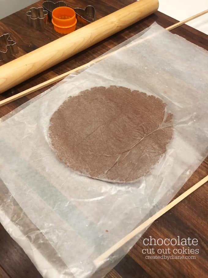 rolling out chocolate sugar cookie dough createdbydiane.com