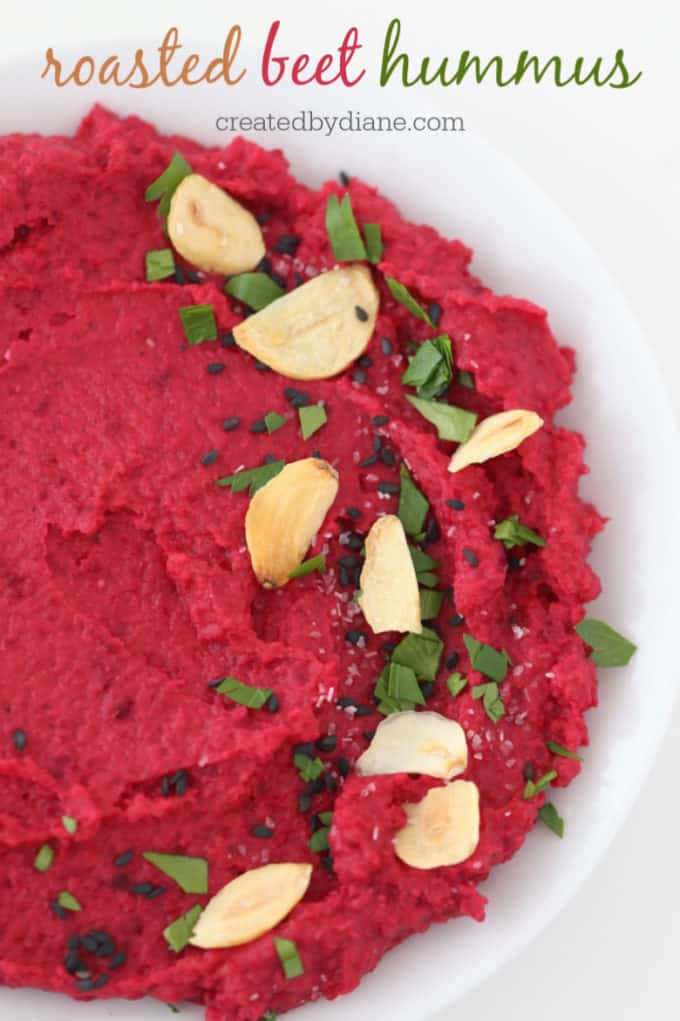 roasted beet hummus topped with roasted garlic and black sesame seeds createdbydiane.com