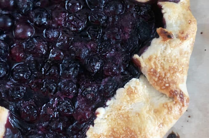 blueberry galette with a crisp crust full of delicious blueberries looks rustic and easy to make