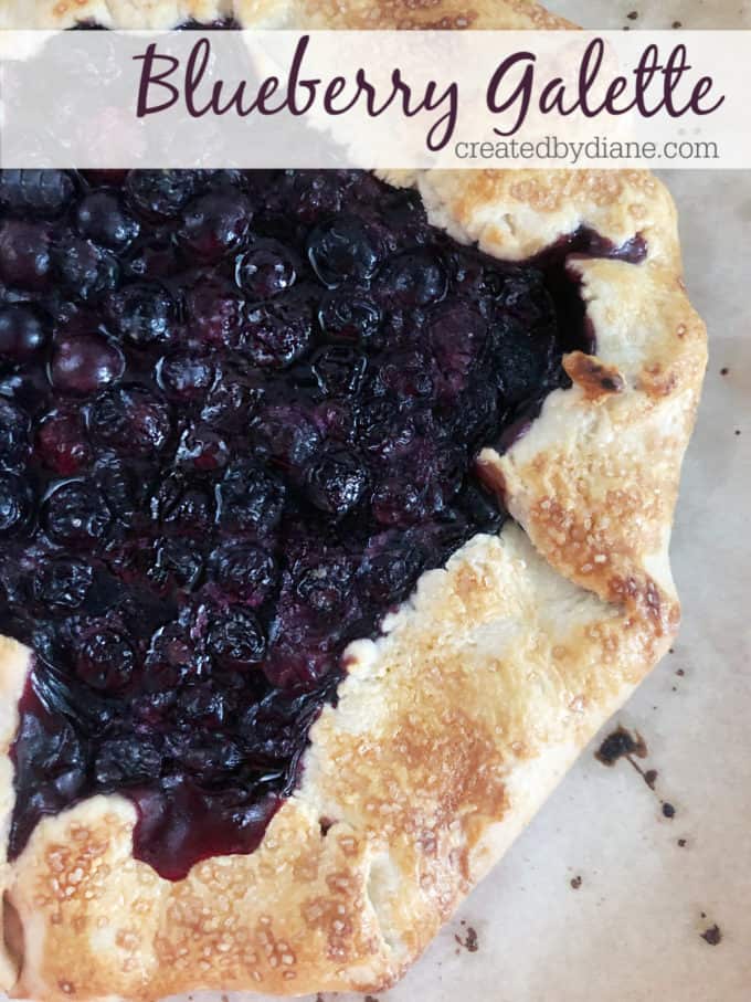 blueberry galette with a crisp crust full of delicious blueberries looks rustic and easy to make 