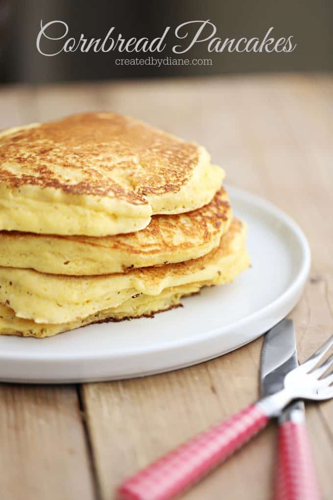 cornbread pancakes on a plate enjoy with syrup or sour cream, jam or butter, sweet or savory breakfast createdbydiane.com