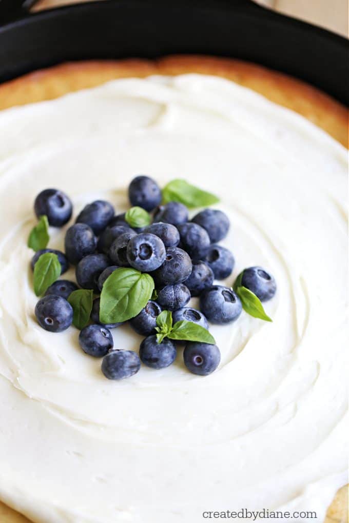 blueberry topped banana blueberry cake baked in a cast iron skillet createdbydiane.com