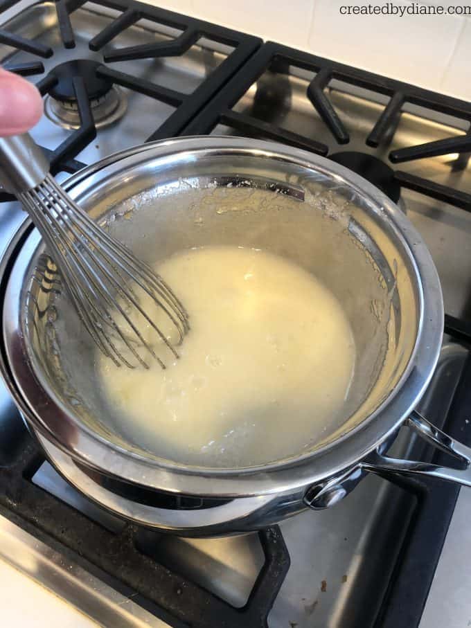 making swiss meringue buttercream frosting createdbydiane.com