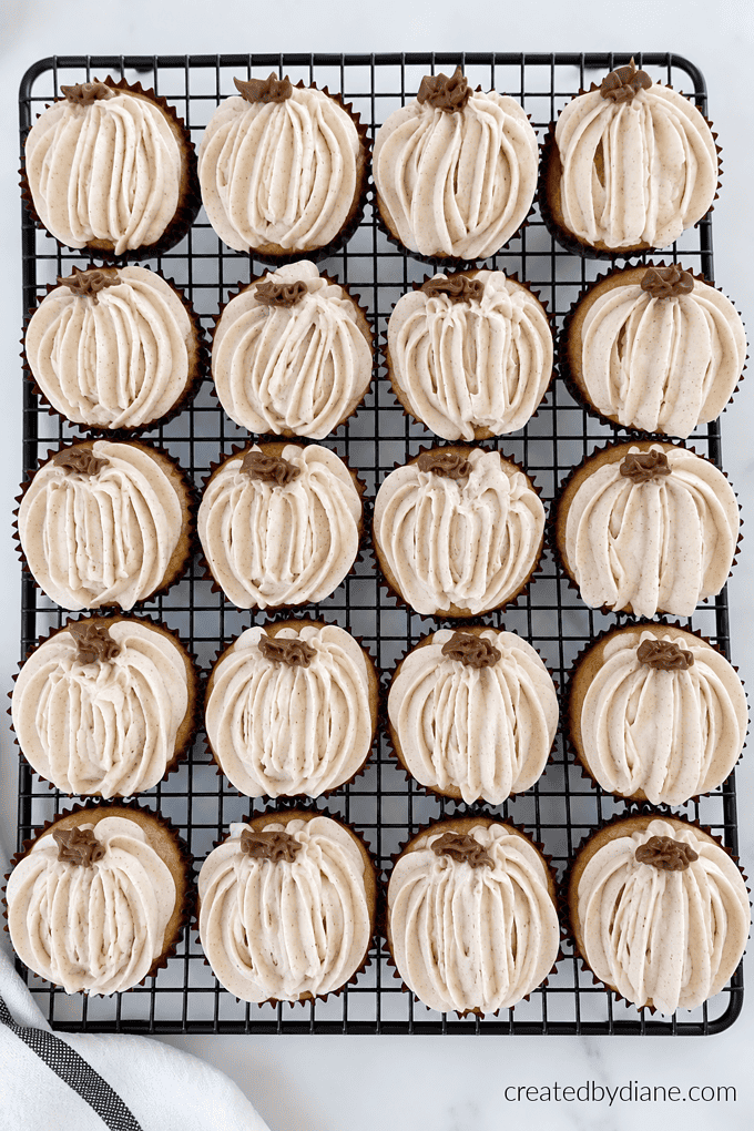 pumpkin looking cupcakes made with pumpkin cupcakes and cinnamon cream cheese frosting the best pumpkin fall treat