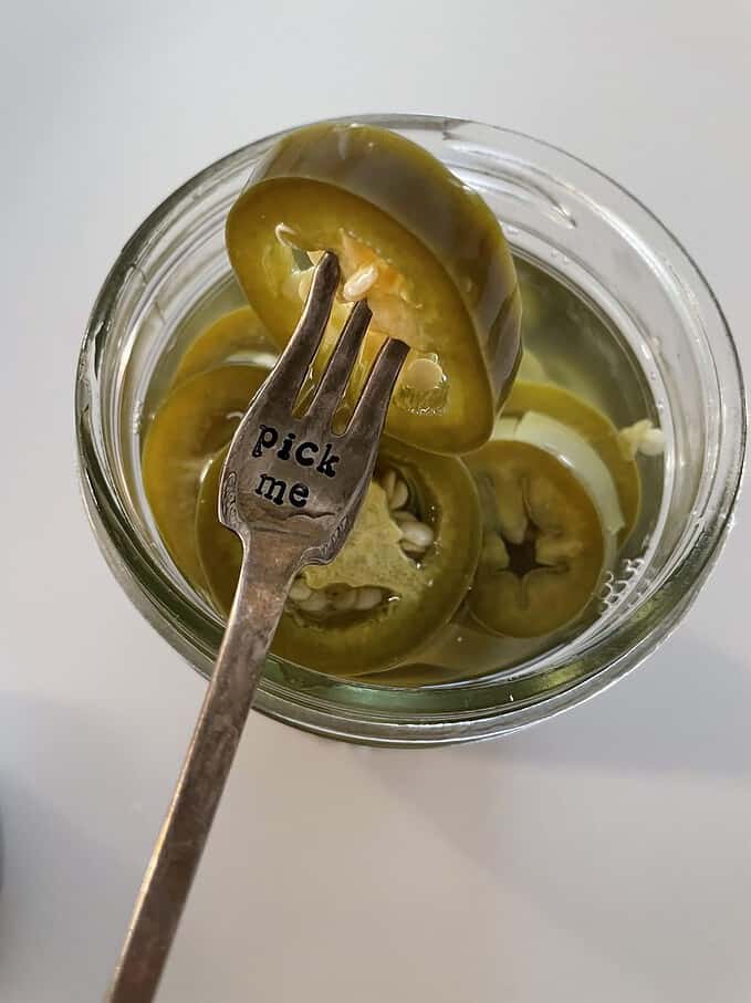 pick me fork in homemade pickled jalapenos