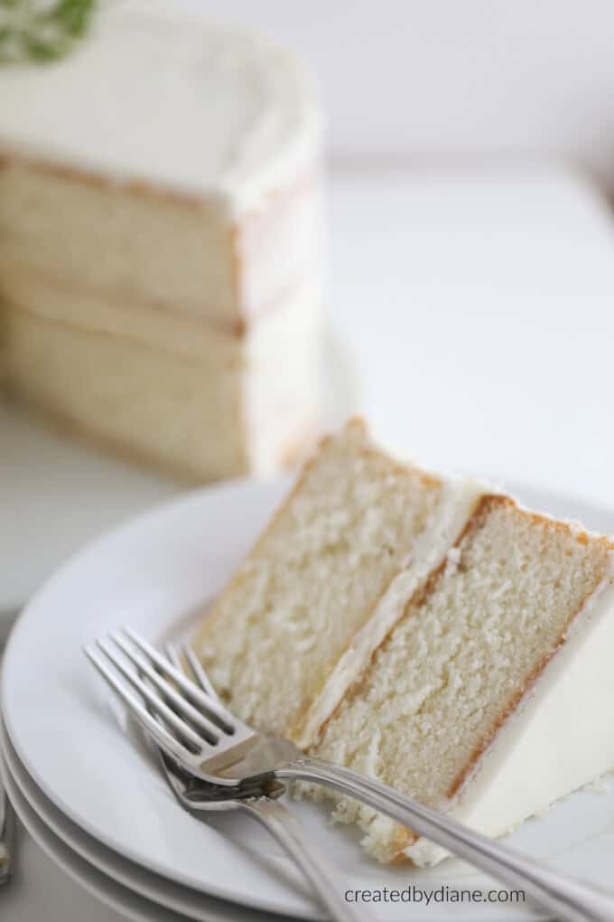 white cake with sour cream frosting 2 layer createdbydiane.com