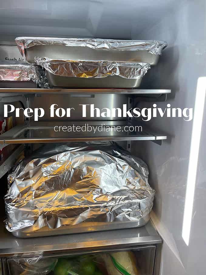 refrigerator filled with PREP FOR THANKSGIVING turkey, side dishes everything ready to go in the oven the next day createdbydiane.com