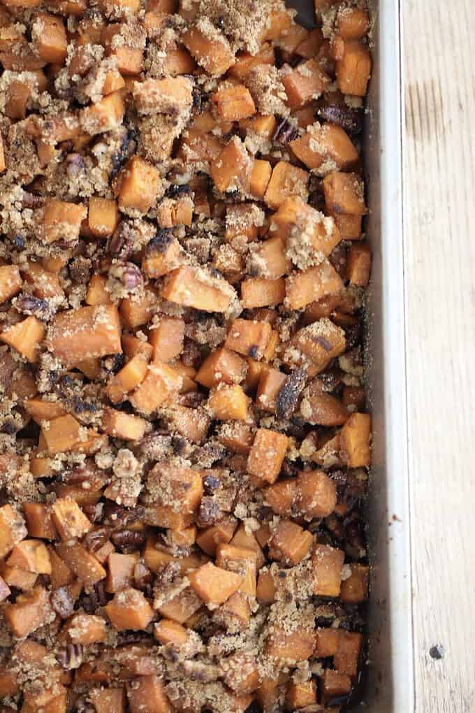 baked chopped sweet potatoes with brown sugar pecan topping