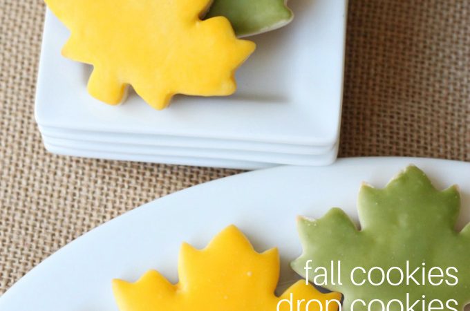 cut out leaf cookies with yellow, red, and green glaze icing