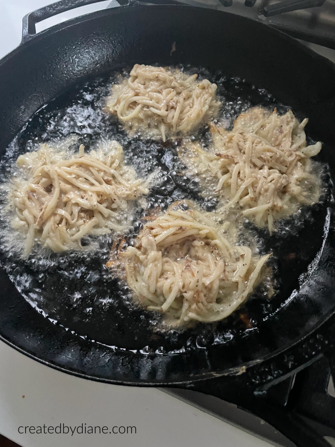 cooking potato pancakes:latkes createdbydiane.com