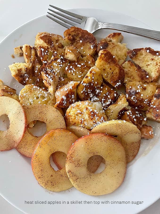sliced heated apples with cinnamon sugar and cut up french toast