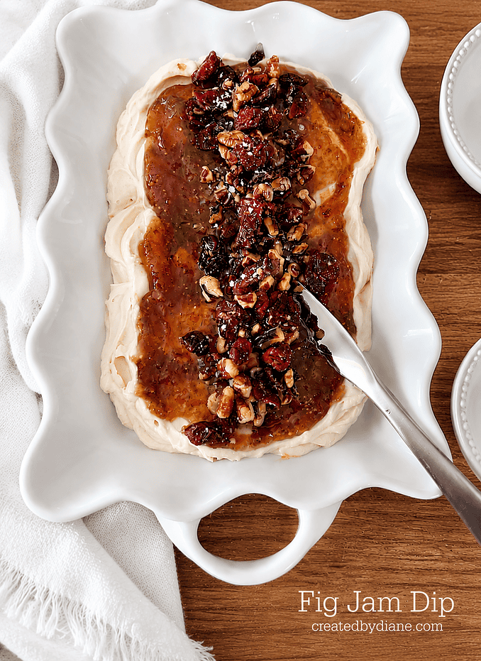fig jam dip topped with nuts and dried cranberries from createdbydiane