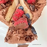 VANILLA CAKE SILKY CHOCOLATE FROSTING with BERRIES createdbydiane.com