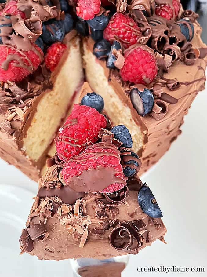 vanilla cake raspberry filling silky chocolate frosting createdbydiane.com
