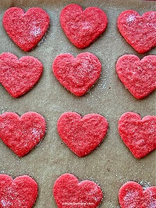 sugared cookies, crunchy and chewy options for these bright red heart sugar cookies, the ultimate to enjoy cookies, perfect for the ones you love, Valentine's Day, to enjoy as you watch your favorite shows the crunchy sugar crystals coat these cookies for an added layer of fantastic-ness!